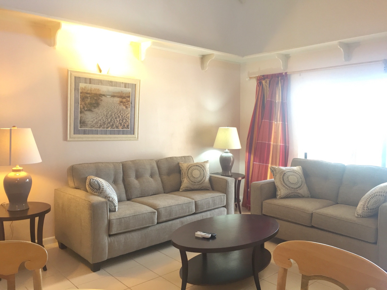 Dining room and living area in the Leeward Cove Second Floor 2 Bedroom / 2 Bathroom condo for sale, St. Kitts 