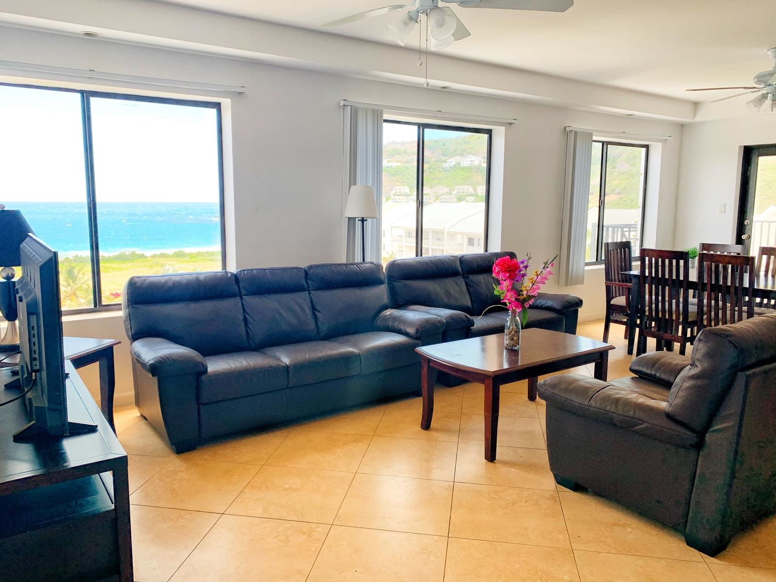 Living room in the St. Christopher Club Gardens 3 Bed- 3 Bath Frigate Bay Student Rentals