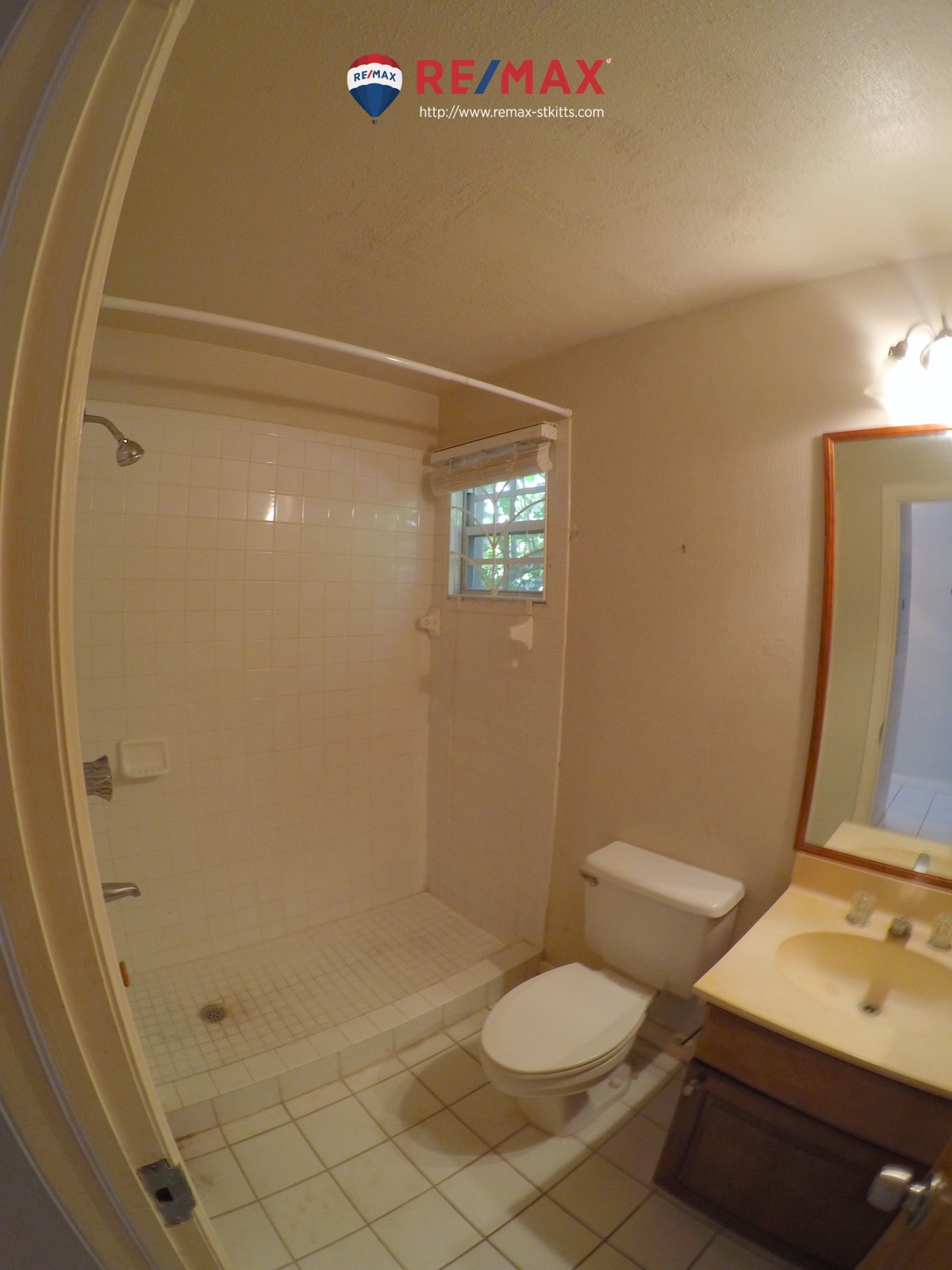 Downstairs bathroom of Two floor, two bedroom apartment for sale, St. Kitts