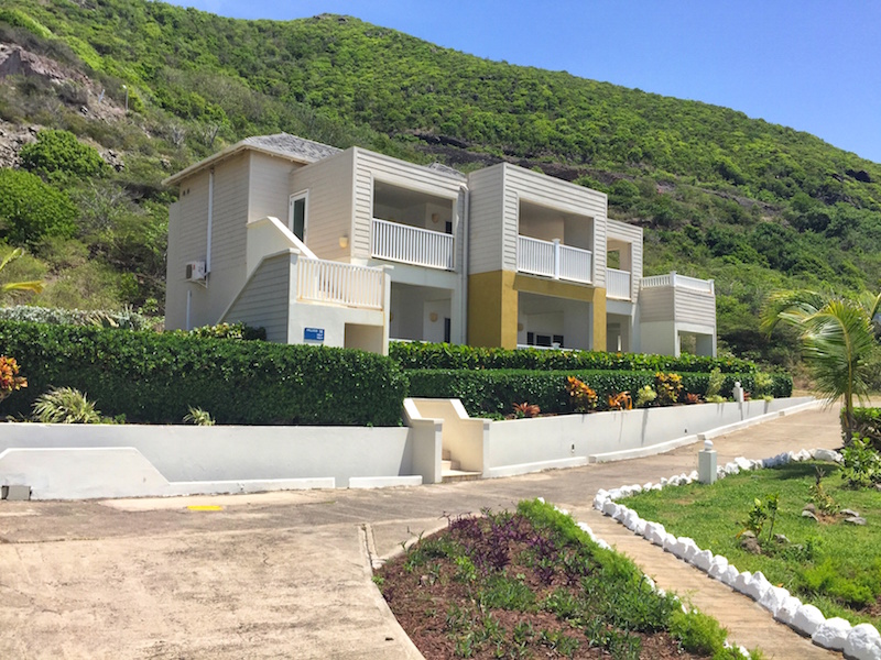 Exterior view of the building of Ocean Edge Resort two bedroom mountain side villa for sale St. Kitts