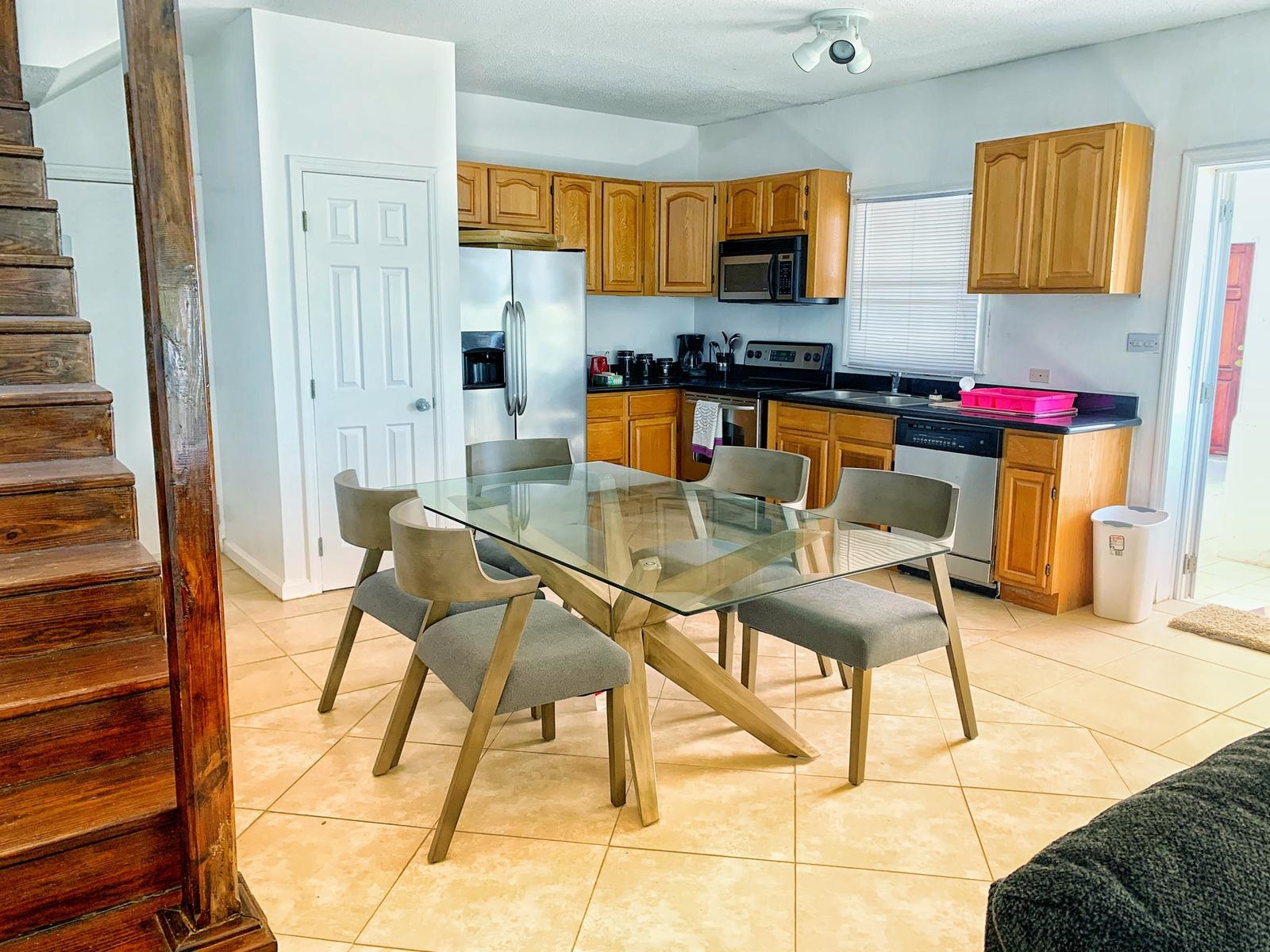 Kitchen and Dining in the in the St. Christopher Club Newly Furnished 3 Bed 3 Bath Penthouse! Student Rentals