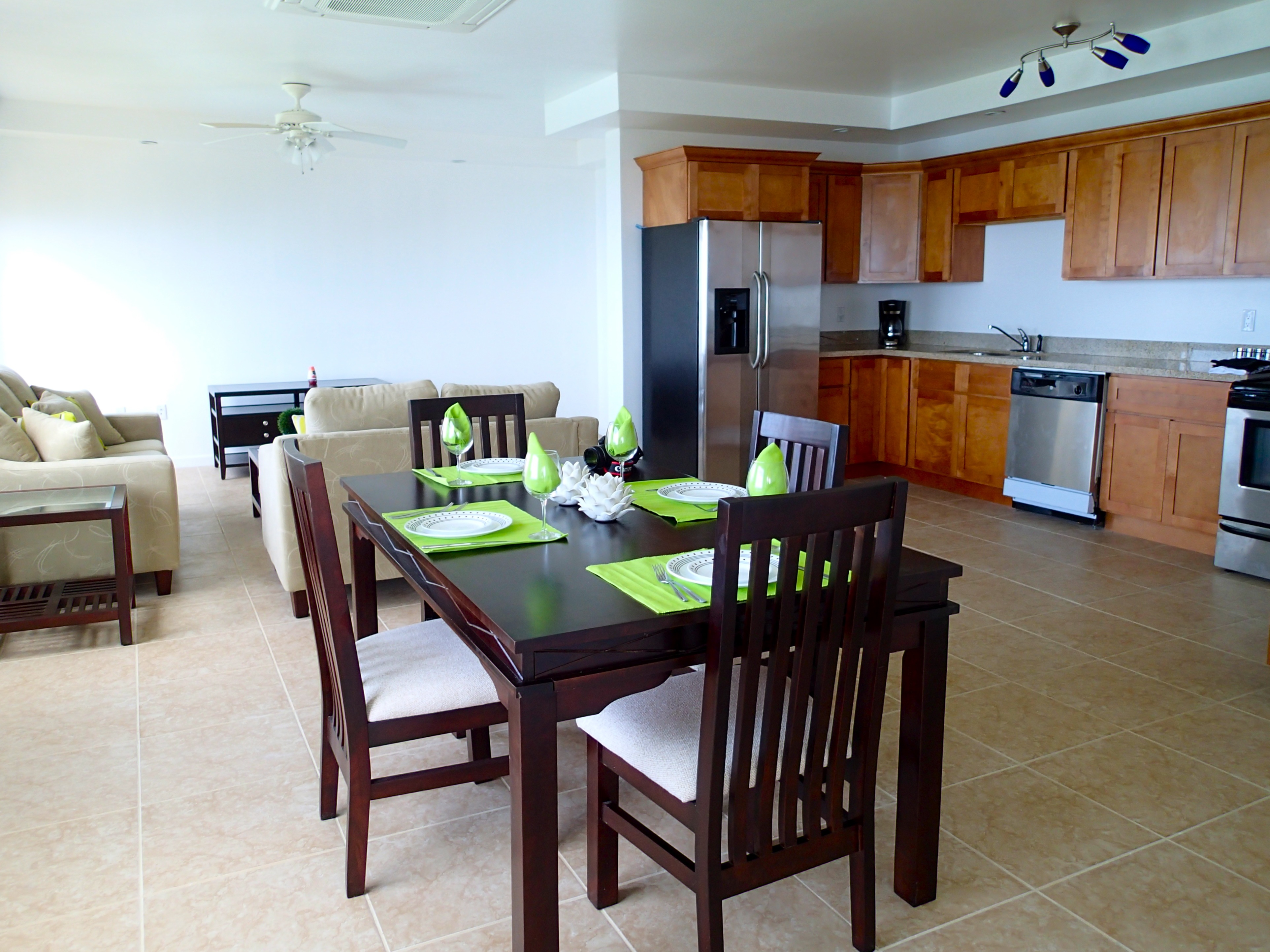 Kitchen and dining in the Manor by the Sea 3 Bed - 3 Bath Condo Student Rentals