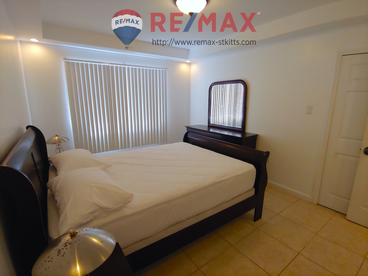 Second guest bedroom of Manor by the Sea 3 bedroom 3 bathroom condo for sale St. Kitts