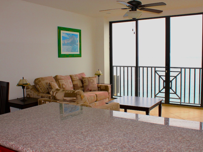 View of living room from the kitchen in the Vista Villas Large 1 bedroom cliff top condos For Rent in St. Kitts
