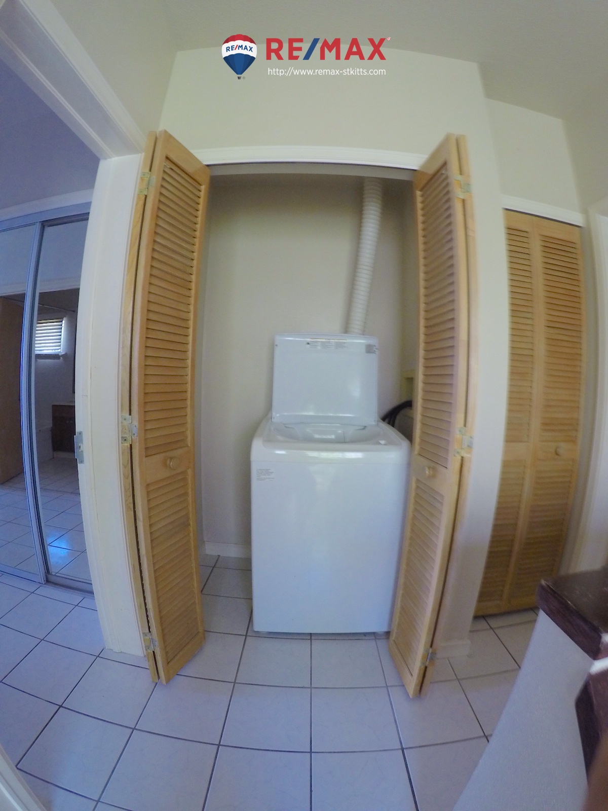 Washing machine closet of Two floor, two bedroom apartment for sale, St. Kitts